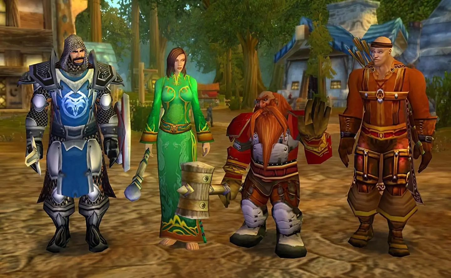 Four distinct World of Warcraft classes standing together